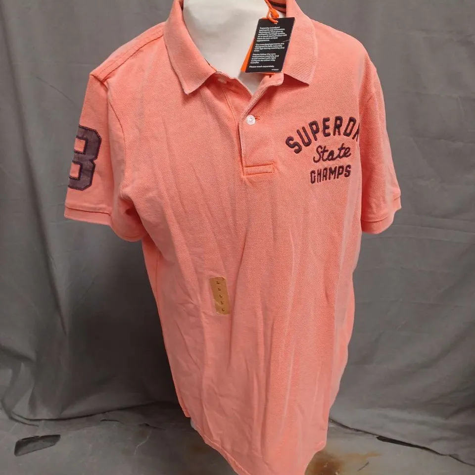 SUPERDRY VINTAGE SUPERSTATE POLO IN SUNBURST CORAL SIZE L