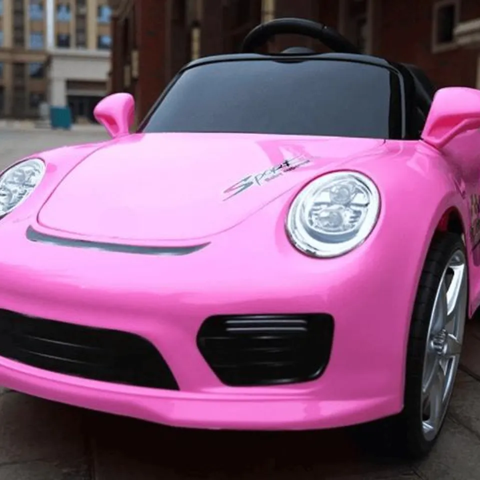 BRAND NEW BOXED KIDS PORSCHE STYLED 12V RIDE ON CAR PINK 