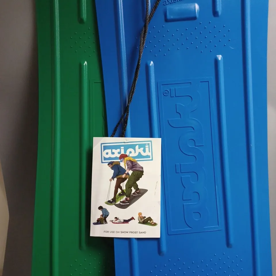 BOXED PAIR OF AXISKI SKI-BOARD