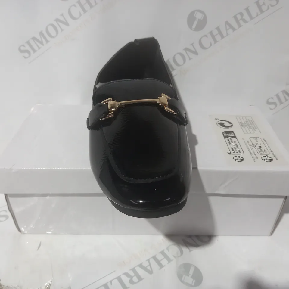 BOXED PAIR OF DESIGNER SLIP-ON SHOES IN BLACK WITH GOLD EFFECT DETAIL EU SIZE 36