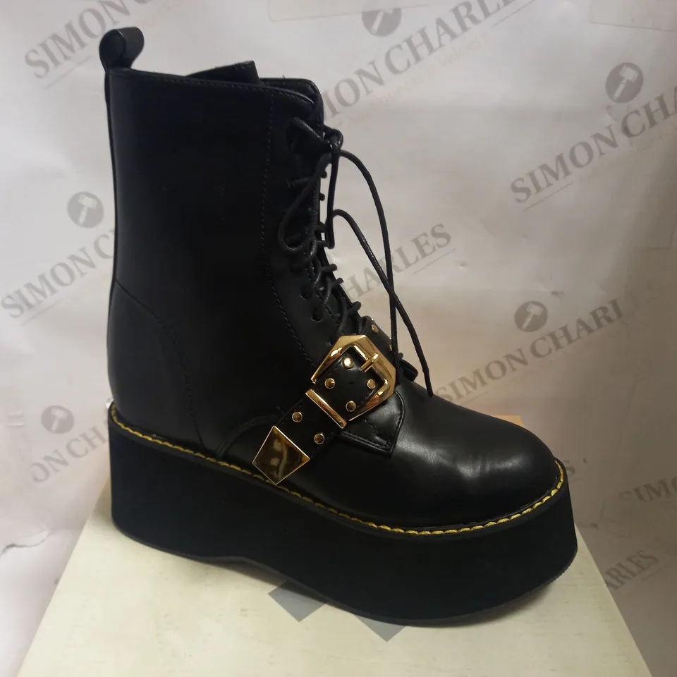 KOI VEGAN RIDDLER MEGA PLATFORM BUCKLE BOOTS - SIZE 5