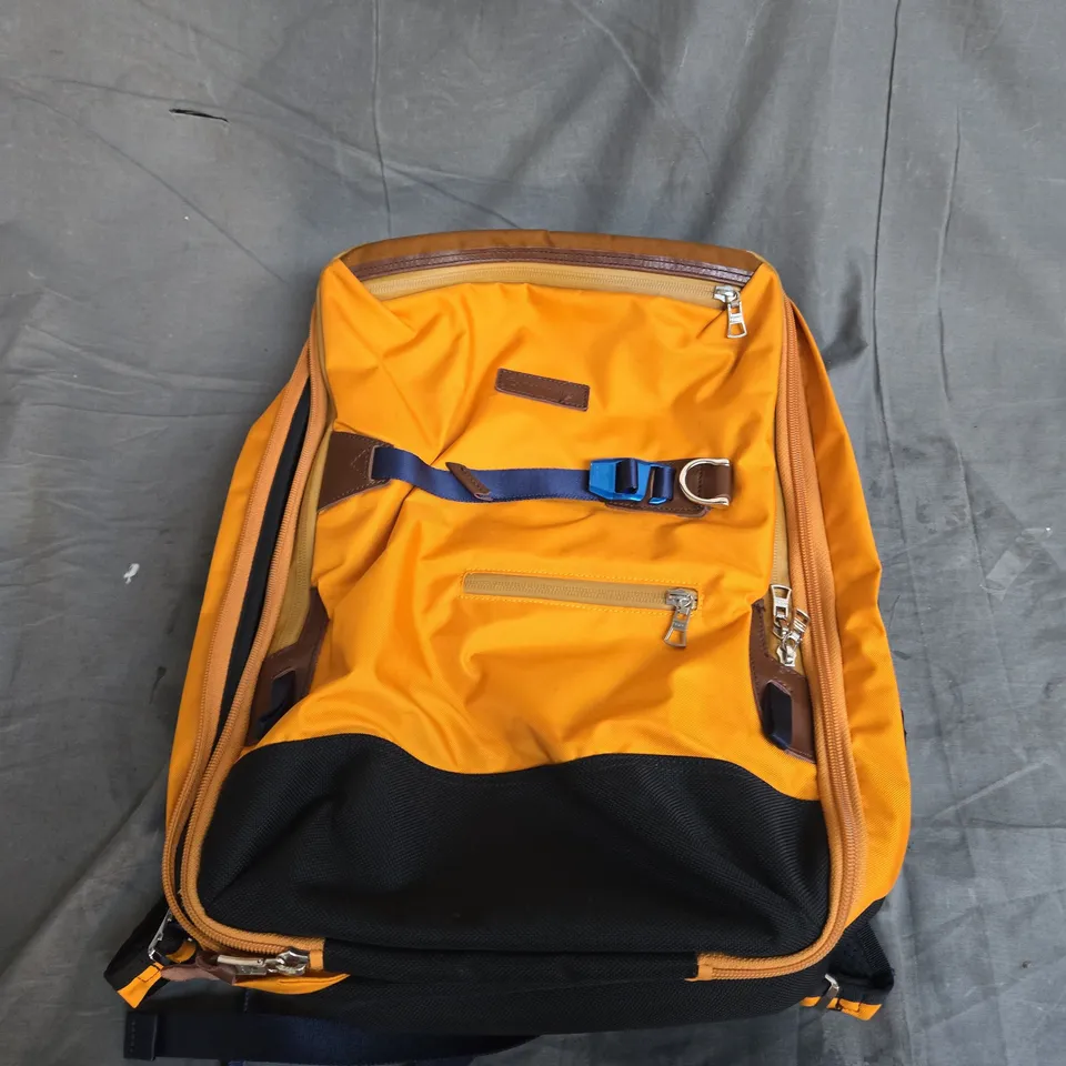 MASTER-PIECE BACKPACK IN YELLOW MULTI