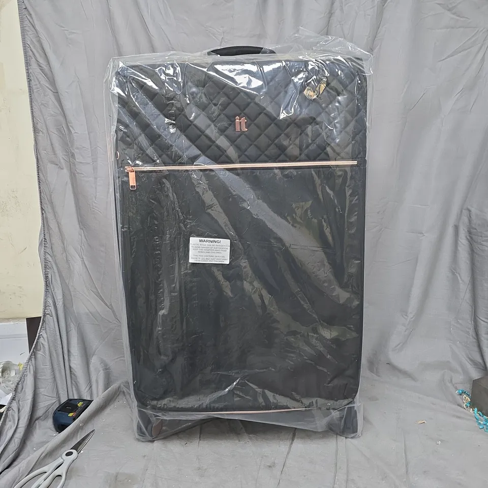 BLACK QUILTED IT SUITCASE WITH FRONT ZIP POCKET AND GOLD 'IT' LOGO