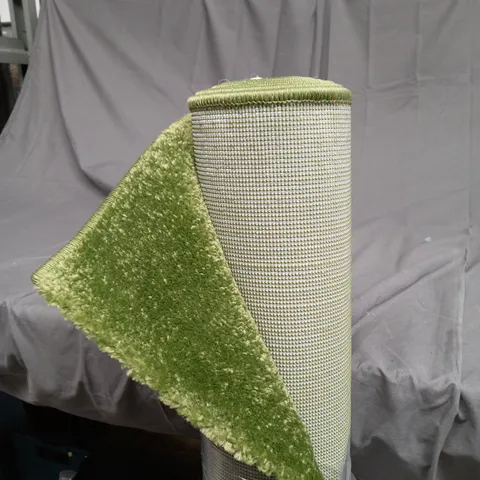 LARGE GREEN RUG - SIZE UNSPECIFIED - COLLECTION ONLY