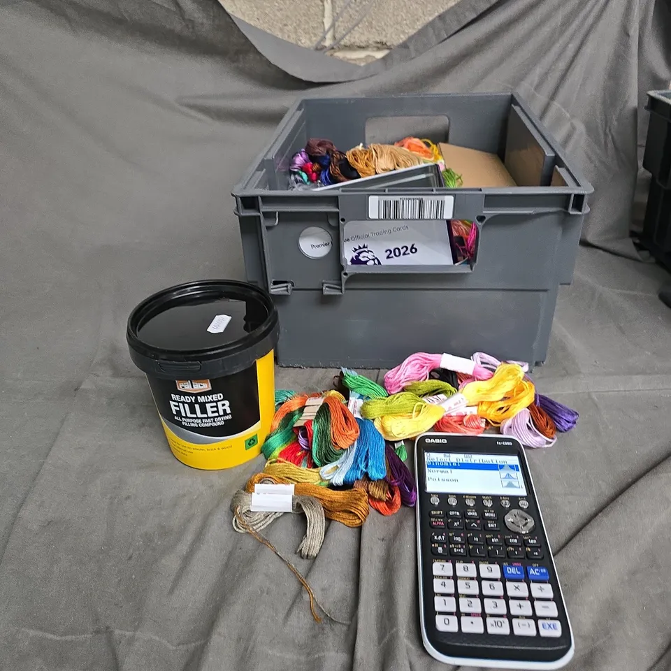 APPROXIMATLEY 20 ITEMS OF ASSORTED EMBROIDERY FLOSS THREADS A SCIENTIFIC CALCULATER AND VARIOUS HOUSEHOLD ITEMS .