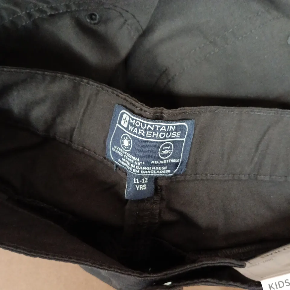 MOUNTAIN WAREHOUSE ACTIVE KIDS ZIP OFF TROUSERS IN BLACK - 11-12YRS