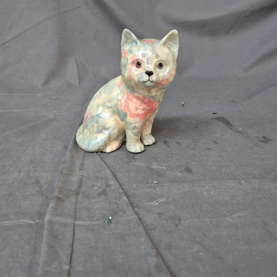 CERAMIC CAT FIGURINE WITH PASTEL MARBLED GLAZE