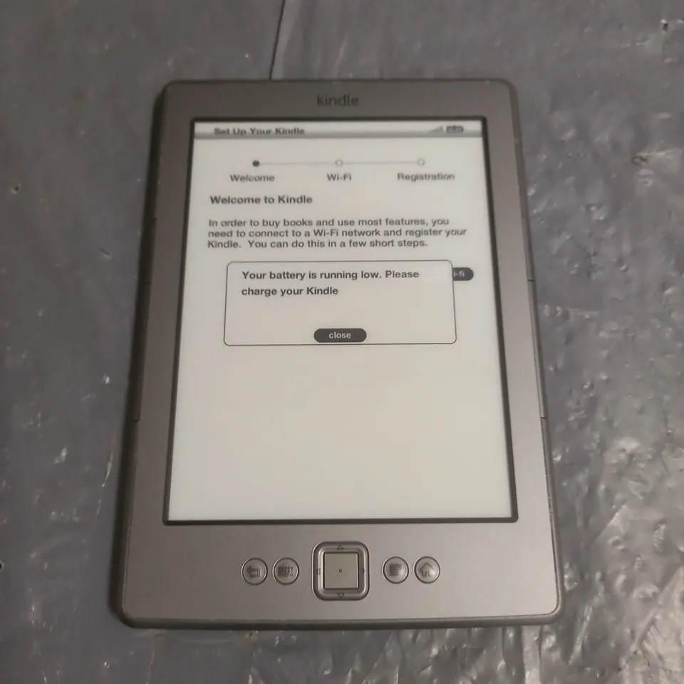 UNBOXED KINDLE DO1100 E-READER IN SILVER