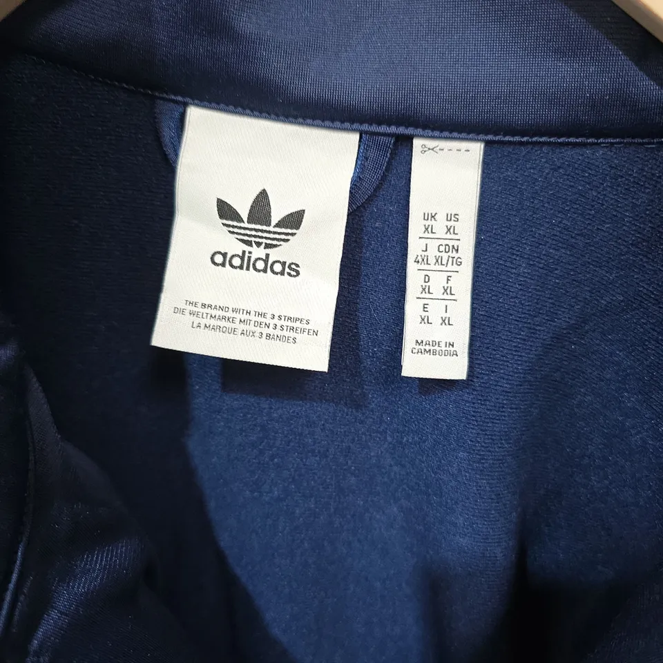 ADIDAS NAVY BLUE TRACK JACKET WITH YELLOW STRIPES – SIZE XL
