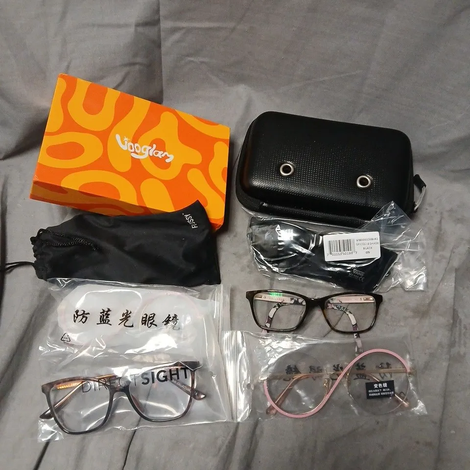 APPROXIAMTELY 15 ASSORTED SUNGLASSES/SPECTACLES IN VARIOUS DESIGNS TL INCLUDE BRANDS SUCH AS VANS, VOOGLAM, FLOSSY, ETC