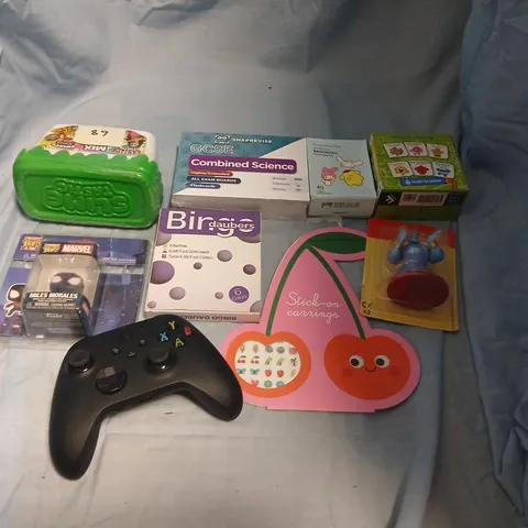 ASSORTED TOYS & GAMES – BLACK GAME CONTROLLER, GCSE COMBINED SCIENCE BOXES, MILES MORALES FIGURE, AND STICK-ON EARRINGS (BOX AND LOOSE ITEMS)