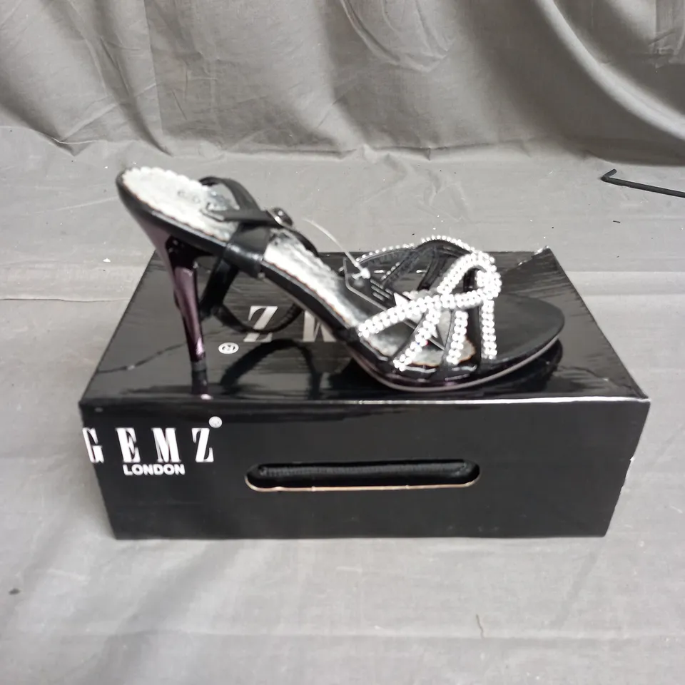BOX OF APPROXIMATELY 12 PAIRS OF GEMS STRAP RHINESTONE HEELS IN BLACK - VARIOUS SIZES