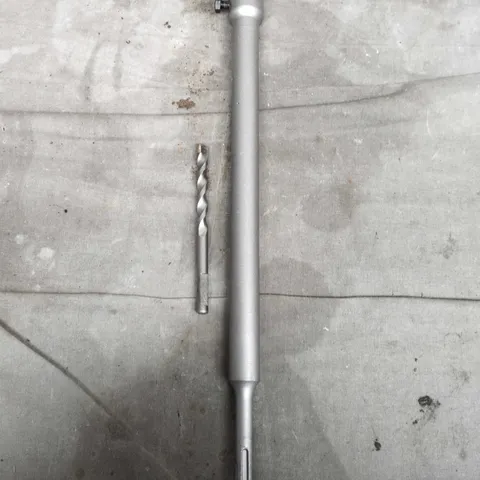 Long steel drill rod with twist drill bit β used