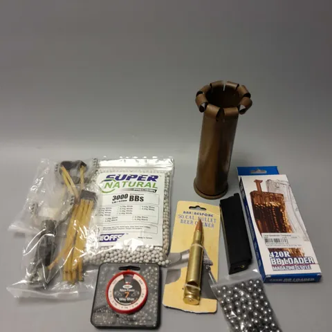 APPROXIMATELY 15 ASSORTED MILITARIA/DEFENCE PRODUCTS TO INCLUDE USED SHELL, SLING SHOTS, BB'S ETC - COLLECTION ONLY 