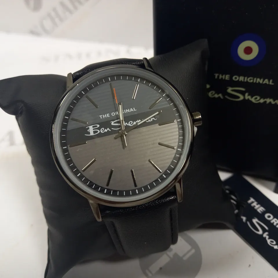 BOXED BEN SHERMAN STAINLESS STEEL BACK WATCH WITH BLACK LEATHER STRAP