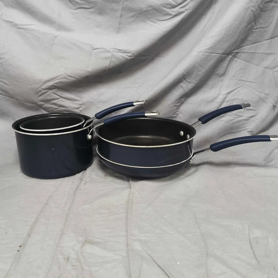 COOKS ESSENTIALS 4-PIECE PAN SET IN BLUE