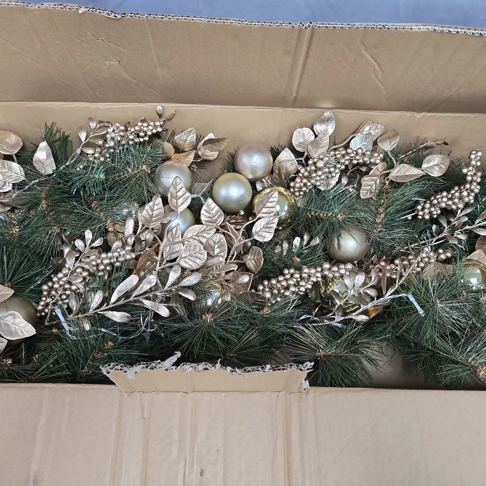 PRE LIT SWAG WITH GOLD BAUBLES AND FOLIAGE 