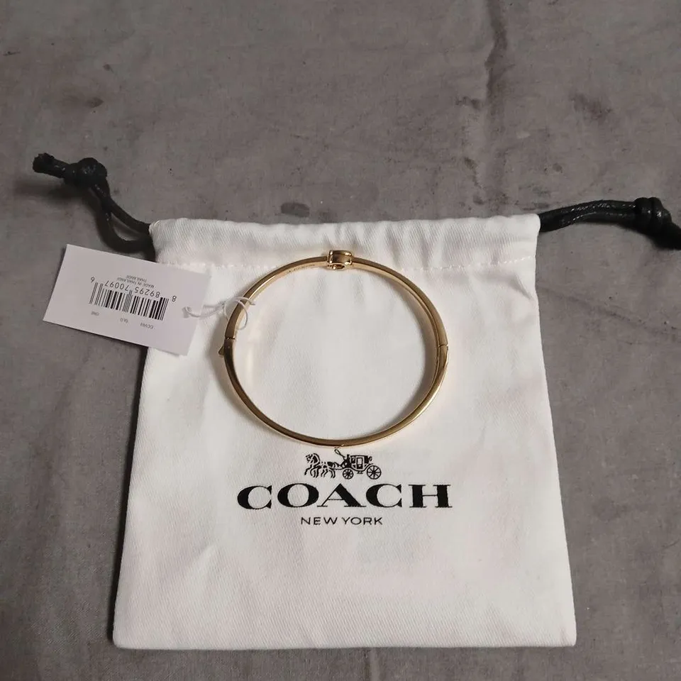 COACH NEW YORK GOLD-TONE BRACELET – BANGLE WITH POUCH
