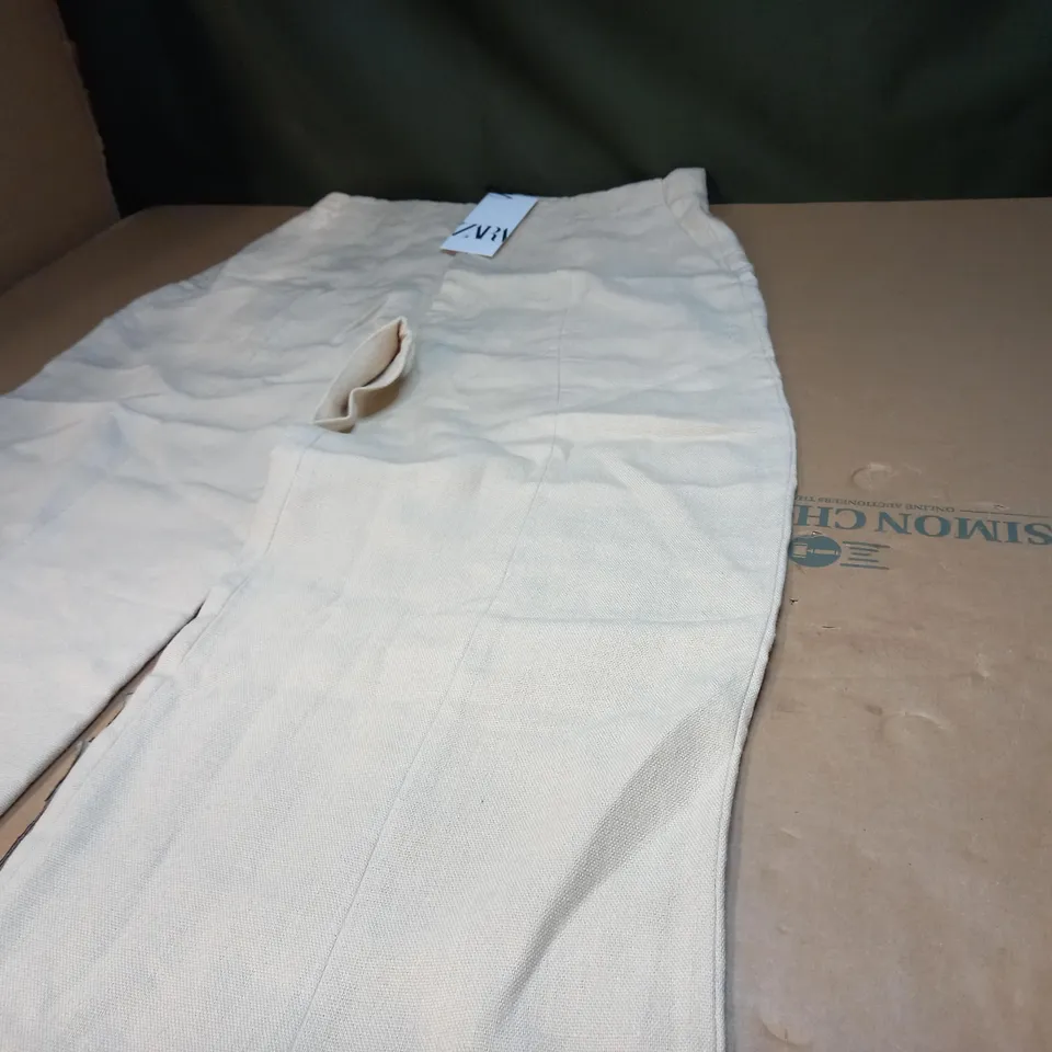 PAIR OF CREAM COTTON TROUSERS - XL