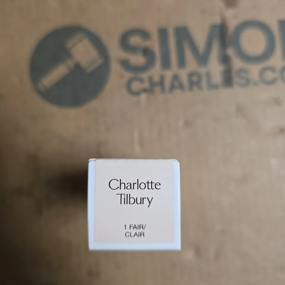 CHARLOTTE TILBURY UNREAL SKIN SHEER GLOW TINT HYDRATING FOUNDATION STICK – 9 G, SHADE 1 FAIR