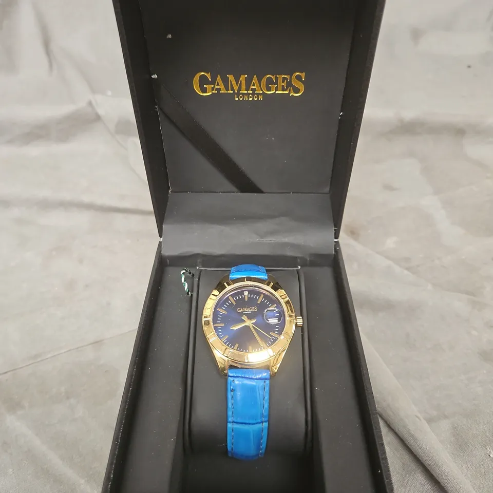 GAMAGES LONDON GOLD-TONE WRISTWATCH WITH BLUE LEATHER STRAP