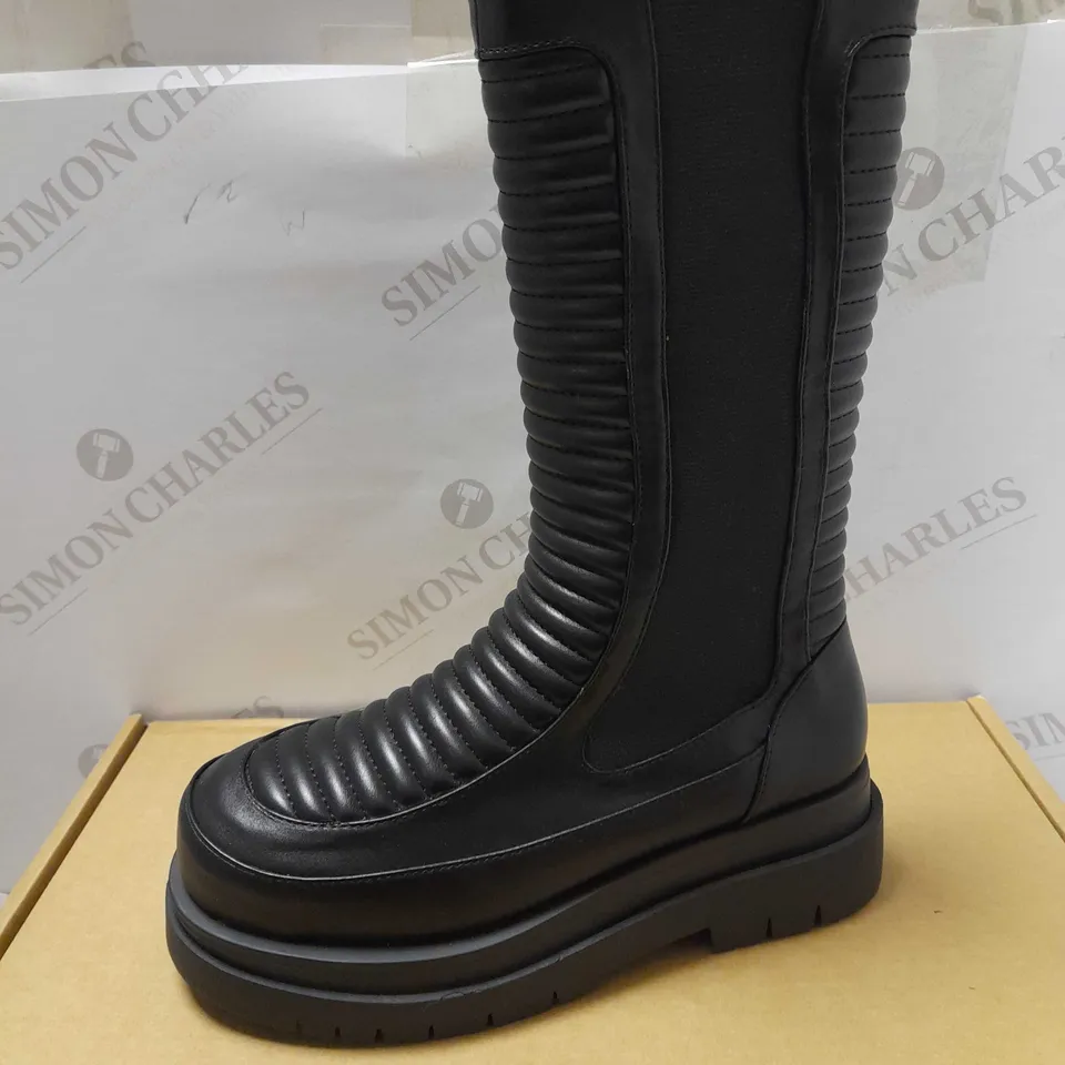 KOI THE HARDY LONG PADDED BLACK BOOTS - SIZE 6