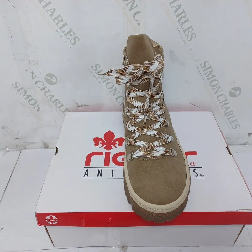 BOXED PAIR OF RIEKER LACE UP CHUNKY BOOTS IN CREAM SIZE 6