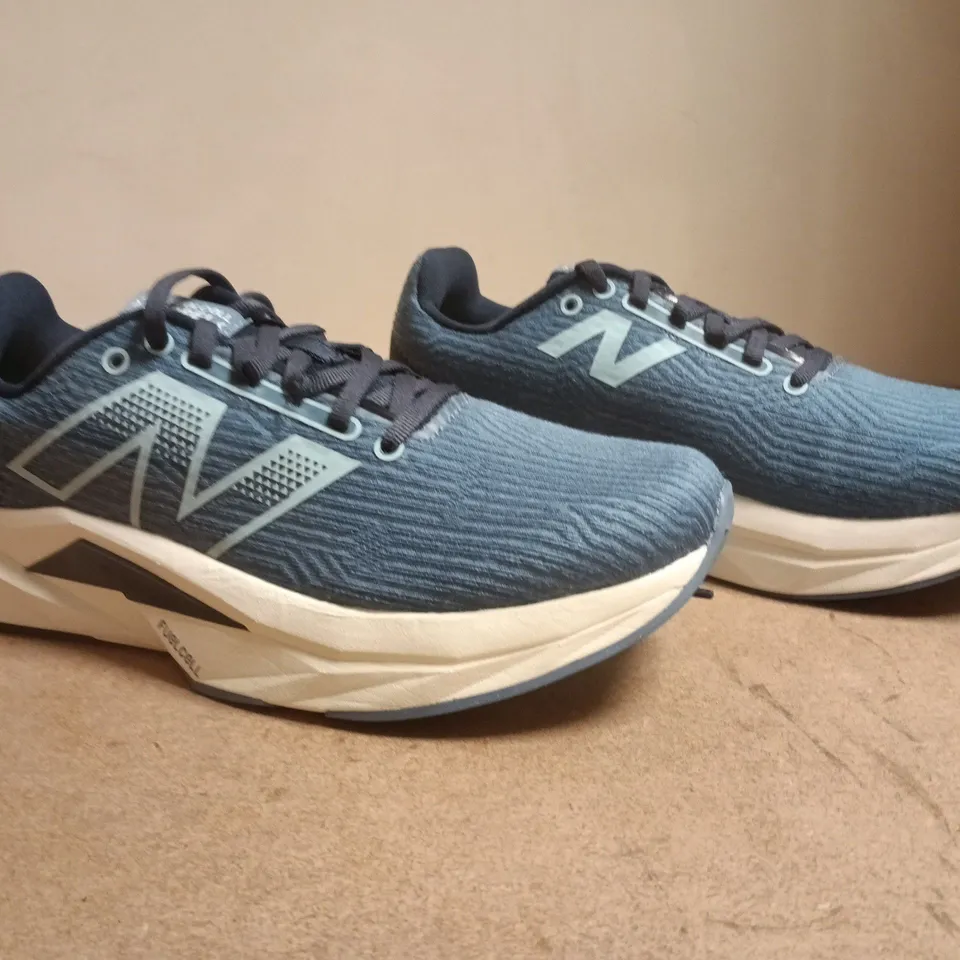 PAIR OF NEW BALANCE FUELCELL TRAINERS IN BLUE SIZE UK 6.5