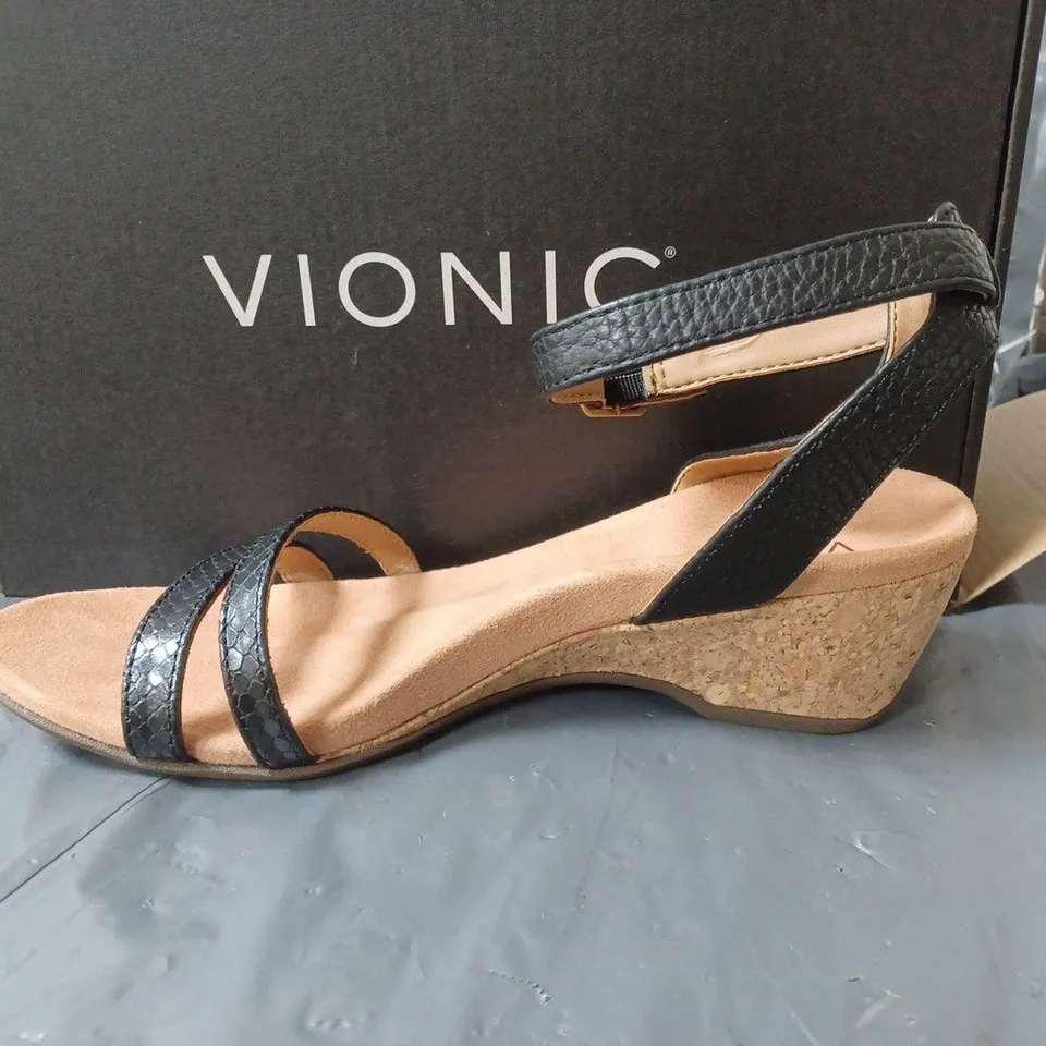 BOXED PAIR OF WEDGE HEELED SANDALS IN BLACK SIZE UNSPECIFIED 