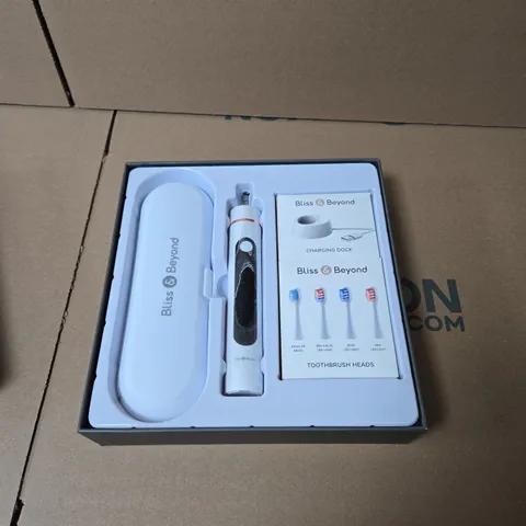 BLISS & BEYOND ELECTRIC TOOTHBRUSH KIT WITH CHARGING DOCK AND REPLACEMENT HEADS