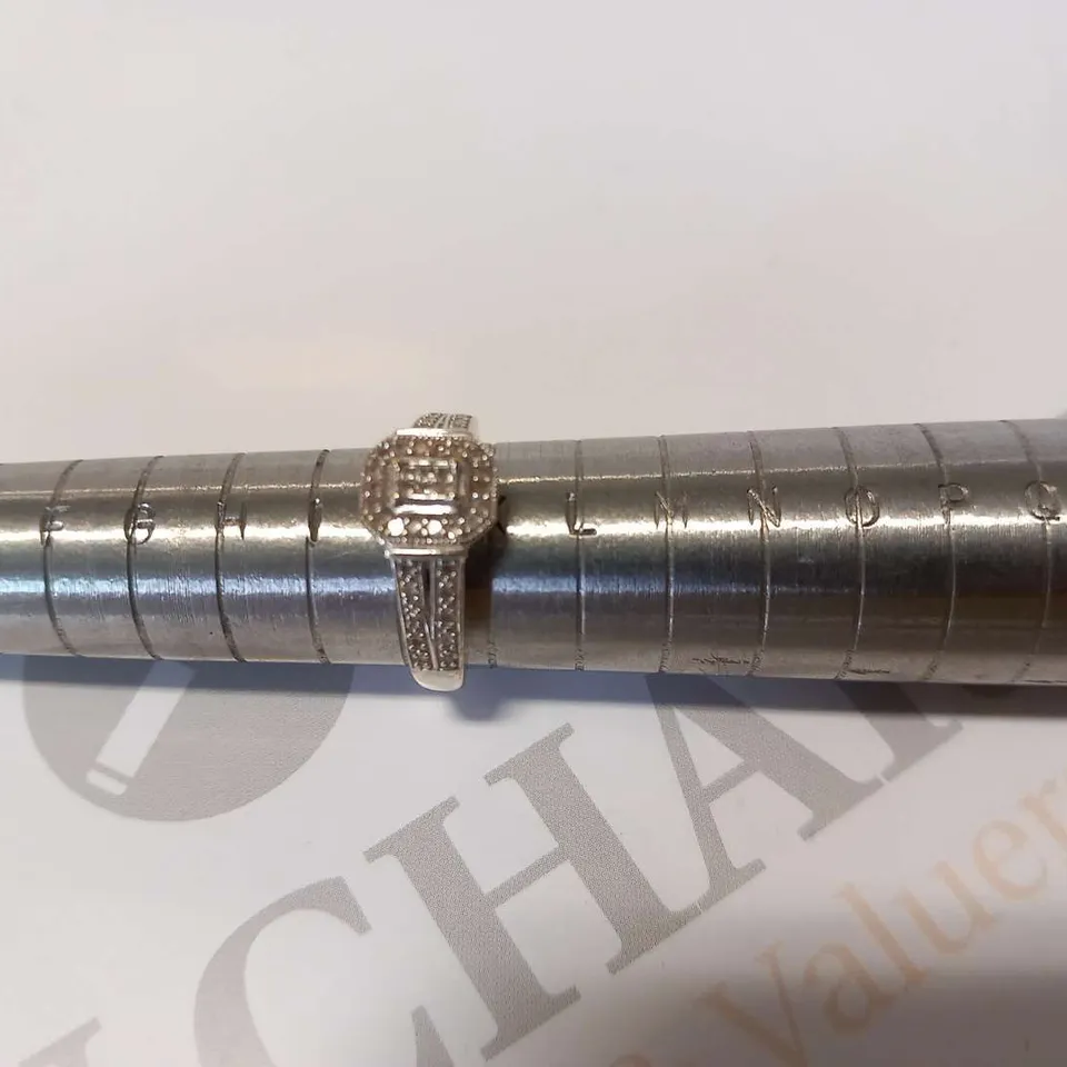 18CT WHITE GOLD DRESS RING SET WITH NATURAL DIAMONDS