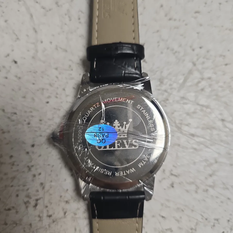 OLEVS QUARTZ WRISTWATCH – BLUE DIAL, STAINLESS STEEL CASE, TWO-TONE LEATHER STRAP