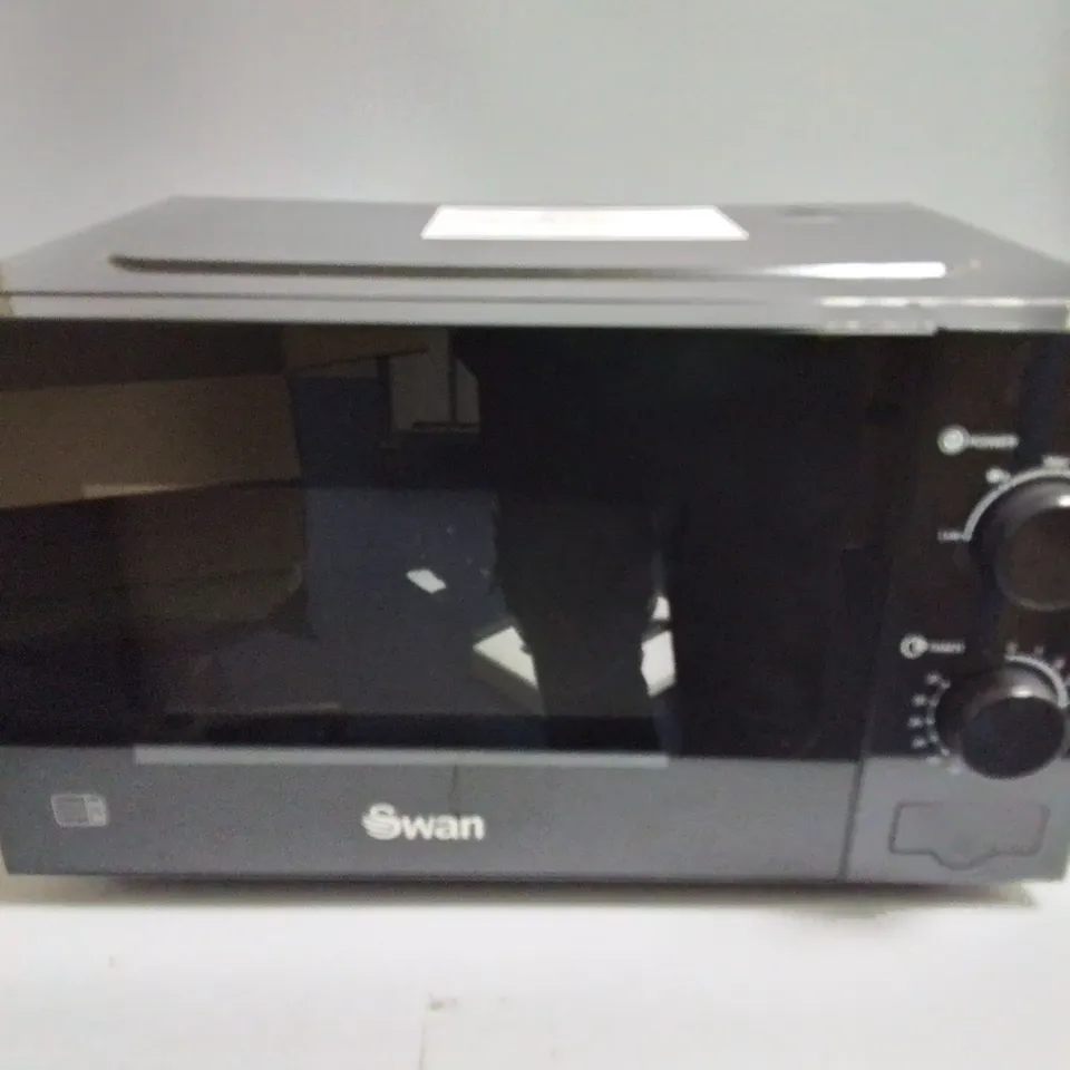 UNBOXED SWAN 20L 700W MANUAL MICROWAVE RRP £54