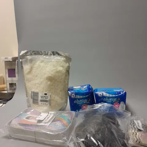 APPROXIMATELY 12 ASSORTED COSMETICS AND BEAUTY ITEMS TO INCLUDE SOYA WAX , SANATORY PADS , SYNTHETIC WIGS , ETC