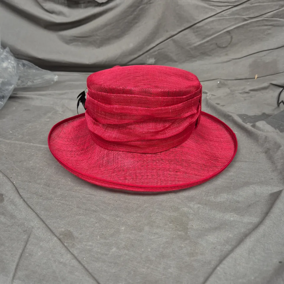 RED WIDE-BRIM HAT WITH BOW AND BLACK LEAF ACCENTS