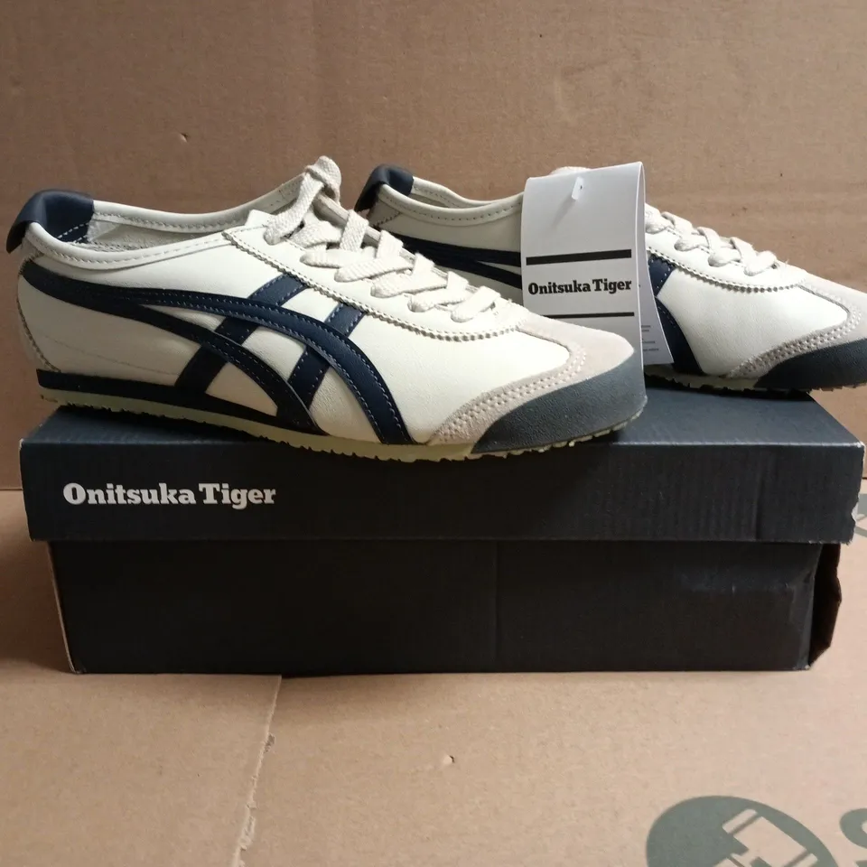 BOXED PAIR OF ONITSUKA TIGER TRAINERS IN BIRCH/NAVY SIZE UK 4.5