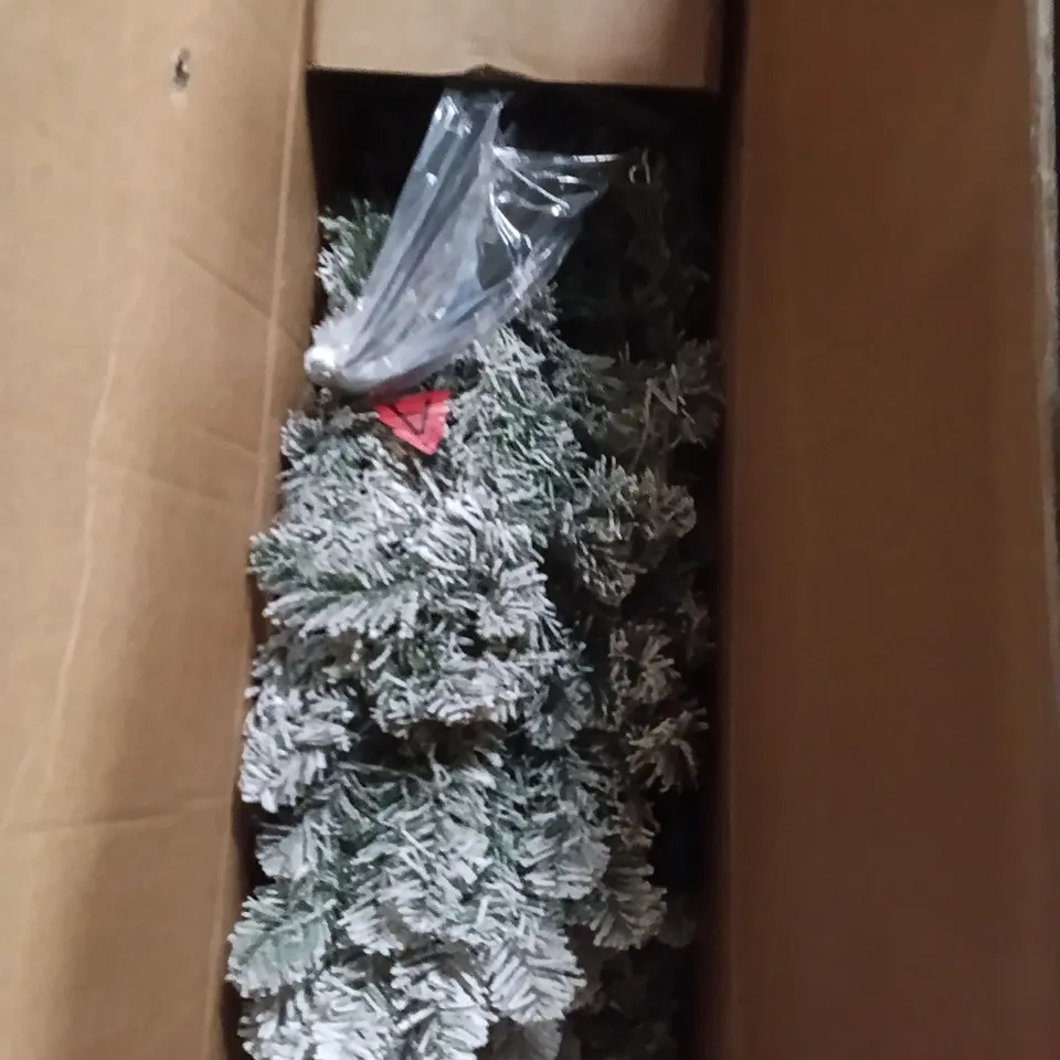 BOXED APPROXIMATELY A 7-FOOT FLOCKED WARM WHITE LED CHRISTMAS TREE