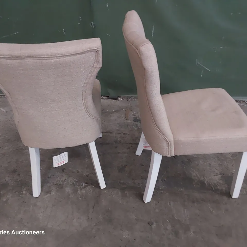 PAIR OF UPHOLSTERED BUTTONED BACK DINING CHAIRS NATURAL FABRIC ON WHITE PAINTED LEGS 