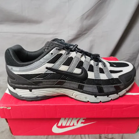 BOXED PAIR OF NIKE P-6000 TRAINERS IN GREY - UK 9