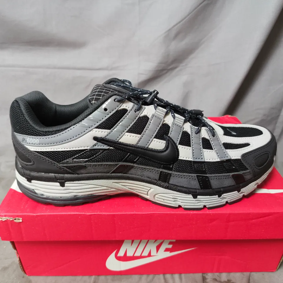 BOXED PAIR OF NIKE P-6000 TRAINERS IN GREY - UK 9