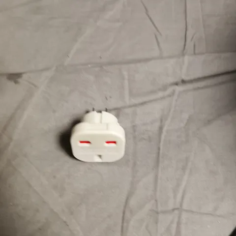 BOX OF APPROXIMATELY 50 X WHITE TRAVEL PLUG ADAPTOR WITH TWO-PIN PRONGS