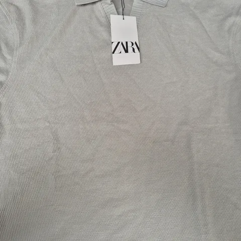 ZARA SHORT SLEEVE TOP IN PALE GREEN SIZE LARGE