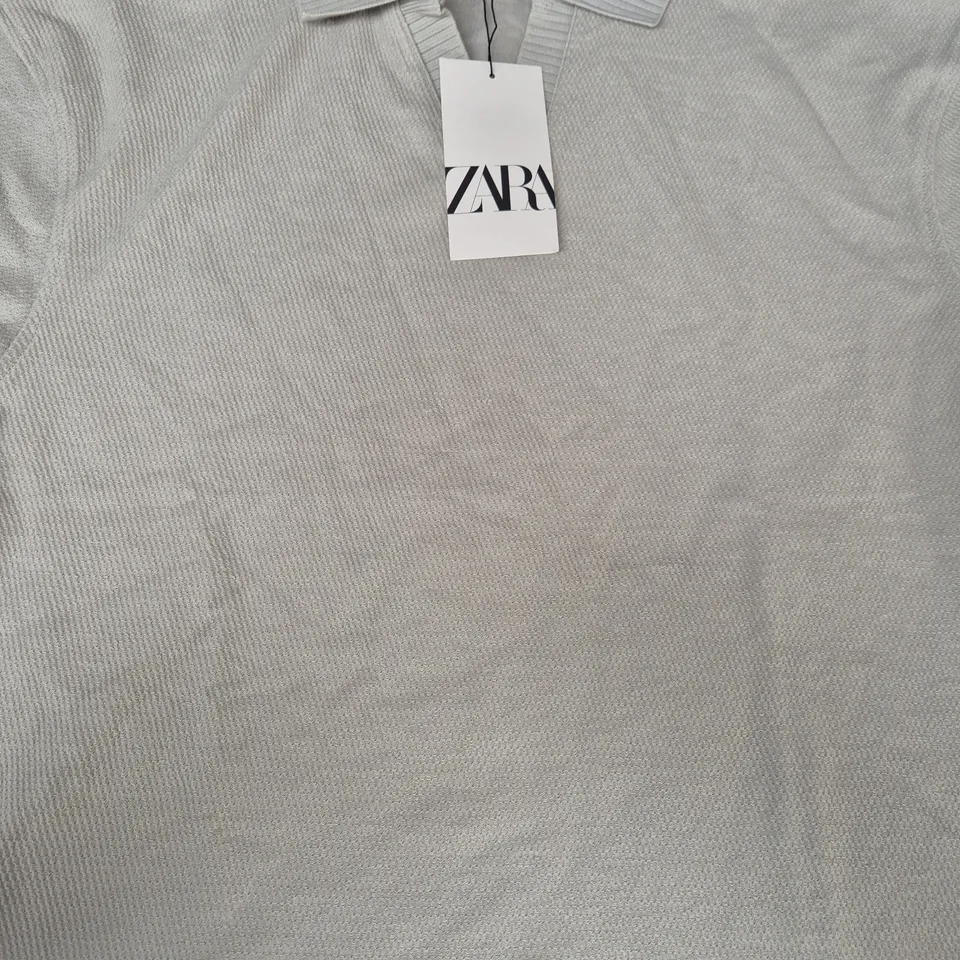 ZARA SHORT SLEEVE TOP IN PALE GREEN SIZE LARGE