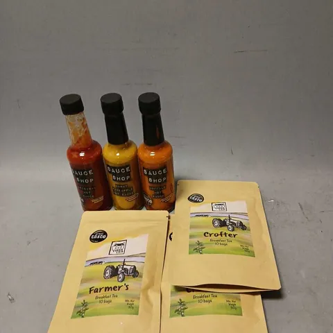 TOTE OF ASSORTED FOOD AND DRINK ITEMS TO INCLUDE VARIOUS HOT SAUCES AND BREAKFAST TEABAGS