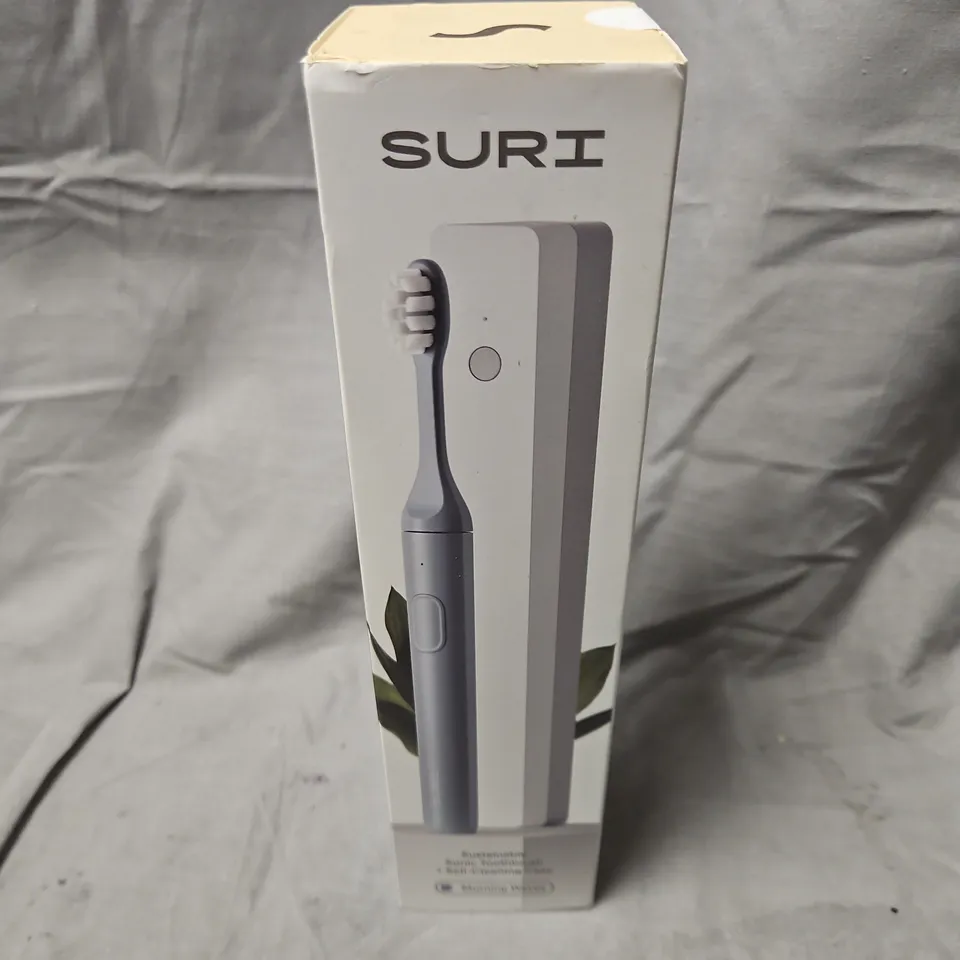 BOXED AND SEALED SURI SUSTAINABLE SONIC TOOTHBRUSH + SELF-CLEANING CASE - MORNING WAVES