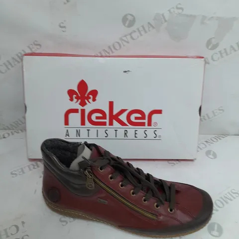 BOXED PAIR OF RIEKER SIDE ZIP WATER RESISTANT BOOTS IN BURGUNDY SIZE 8