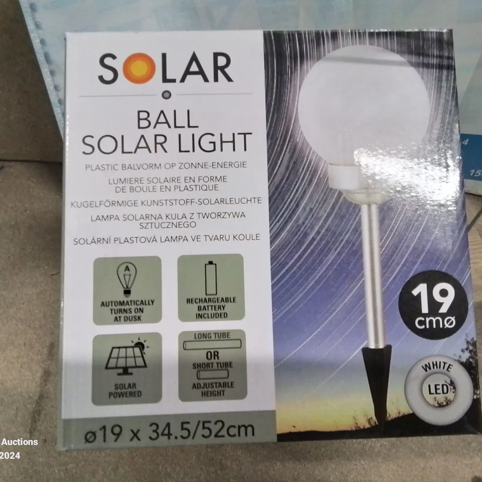 MIXED LOT TO INCLUDE, X4 SOLAR BALL LIGHTS,APPROXIMATELY 200 PASSPORT CASES, LARGE NUMBER OF SMARTPHONE SPLITTER CABLES ETC