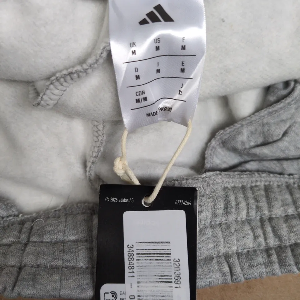 ADIDAS GREY JOGGERS WITH BLACK SIDE STRIPES – SIZE M (MEN)