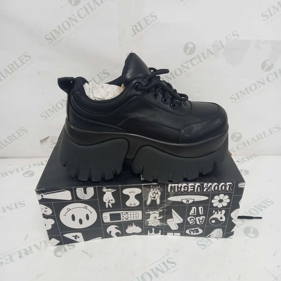 BOXED PAIR OF KOI FOOTWEAR CHRONICLES VILUM PLATFORM TRAINERS IN BLACK - SIZE 3