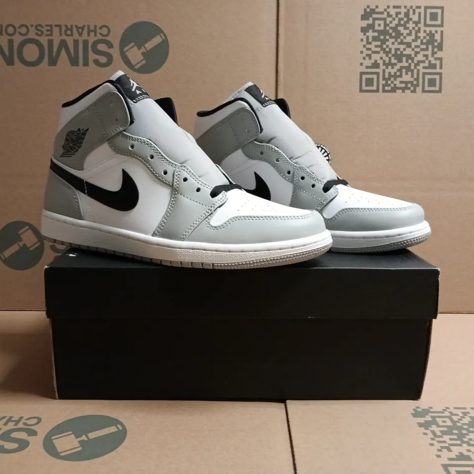 BOXED PAIR OF AIR JORDAN 1 MID SHOES IN GREY/WHITE SIZE UK 7